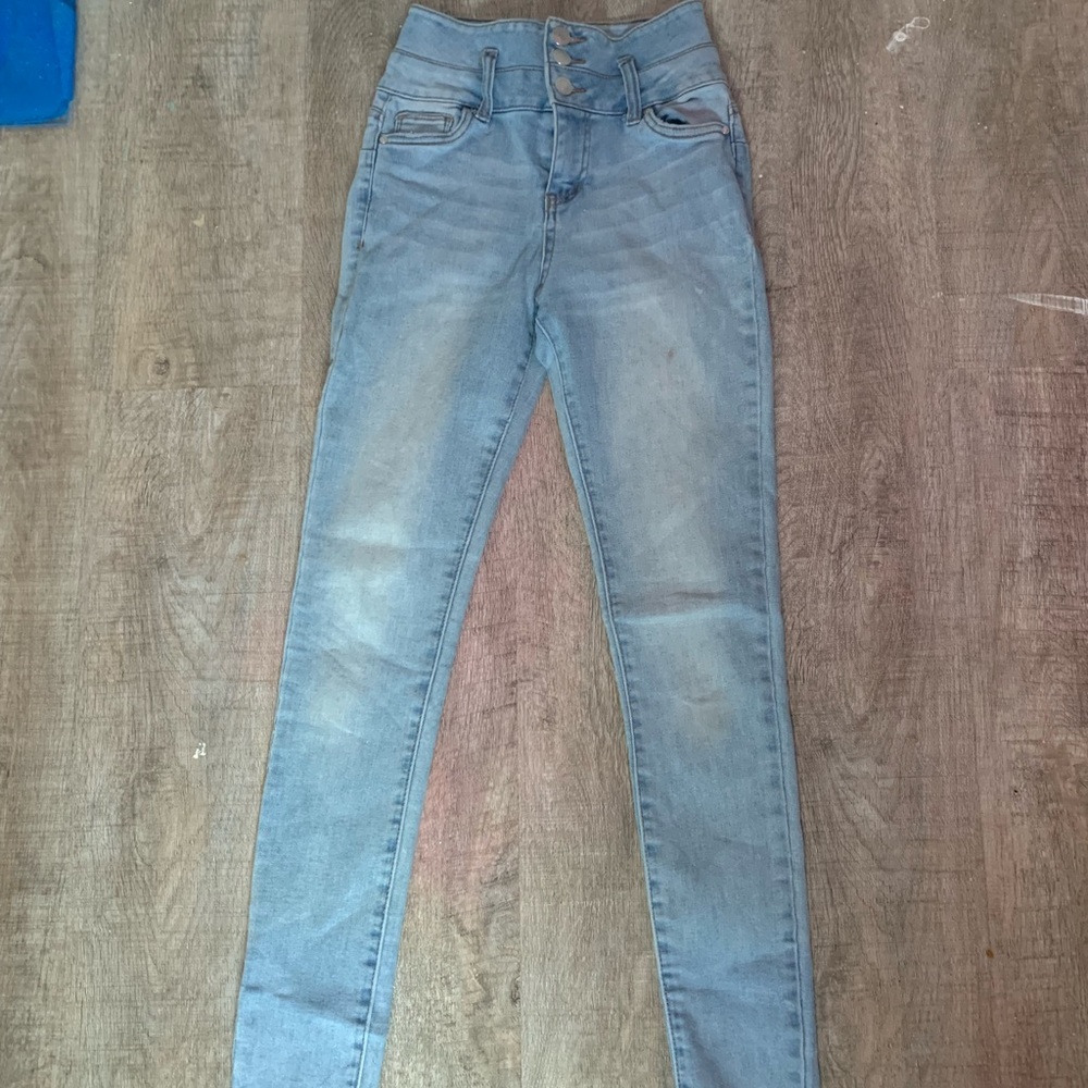 Blue skinny jean, size 0, multiple button